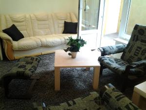 Posezení v ubytování Jaani 2-1 Apartment