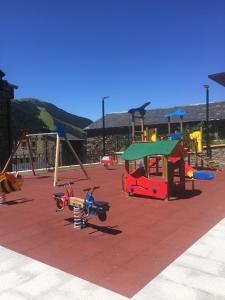 a playground with many different types of play equipment at Casa Nova Regi in Soldeu