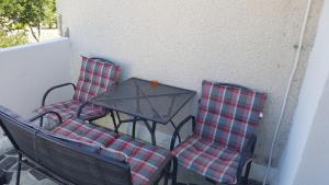 Ein Sitzbereich in der Unterkunft Apartments Knežević