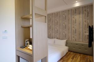 Postel nebo postele na pokoji v ubytování iLiving B&B