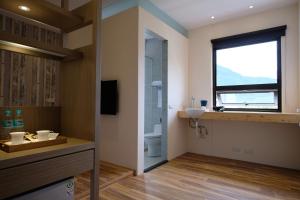 TV a/nebo společenská místnost v ubytování iLiving B&B
