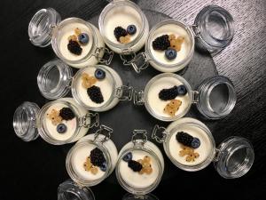 a bunch of dishes of food in glasses at Residenza RoMa in Tropea
