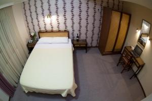 Posteľ alebo postele v izbe v ubytovaní Olympos Hotel