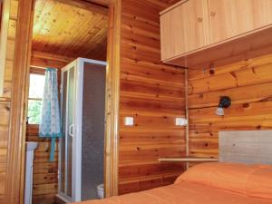 Postel nebo postele na pokoji v ubytování Cabañas de Madera Sanabria