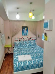Postel nebo postele na pokoji v ubytování Phloenlom Chomdao