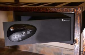 a remote control sitting inside of a microwave oven at Thebe River Safaris in Kasane