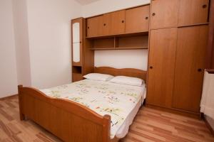 Postel nebo postele na pokoji v ubytování Apartments Stanko