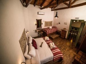 Postel nebo postele na pokoji v ubytování Villa Archanes