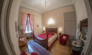 Postel nebo postele na pokoji v ubytování Castello Di Mornico Losana