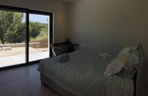 A bed or beds in a room at Villa las Colinas Golf Resort