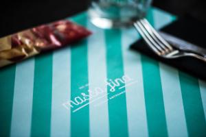 a fork and a napkin on a table at Vila Galé Estoril in Estoril