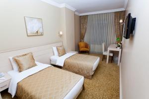Ένα ή περισσότερα κρεβάτια σε δωμάτιο στο Classes Boutique Hotel