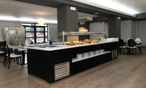 Kuchyňa alebo kuchynka v ubytovaní Summer Hotel