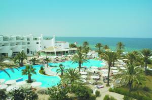 an aerial view of a resort with a swimming pool at El Mouradi Skanes in Monastir