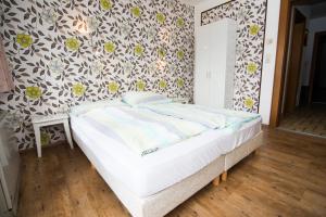Postel nebo postele na pokoji v ubytování Haus Brandeck