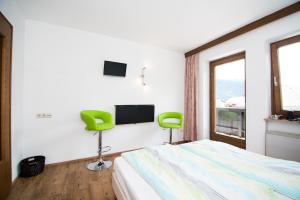 TV a/nebo společenská místnost v ubytování Haus Brandeck