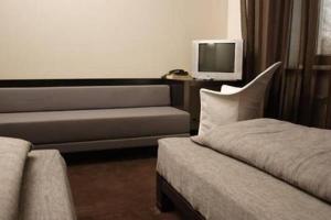 A bed or beds in a room at Xcelsus, free parking