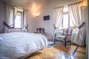 Postel nebo postele na pokoji v ubytování Castello Di Mornico Losana