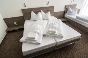 Łóżko lub łóżka w pokoju w obiekcie Lifestyle Hotel Leithana