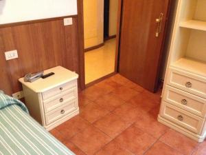 Postel nebo postele na pokoji v ubytování Albergo Sonia