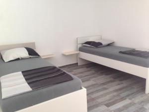Posteľ alebo postele v izbe v ubytovaní Chill Out Beach Apartments