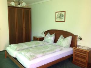 Letto o letti in una camera di Haus Kärnten
