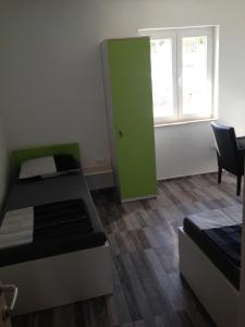 Posteľ alebo postele v izbe v ubytovaní Chill Out Beach Apartments