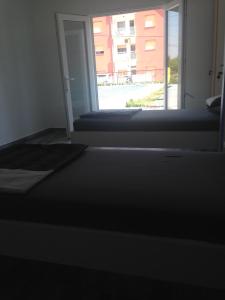 Posteľ alebo postele v izbe v ubytovaní Chill Out Beach Apartments