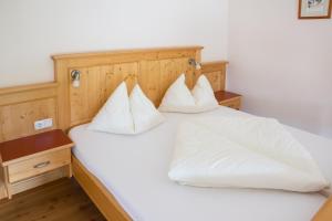 Tempat tidur dalam kamar di Waldbothgut