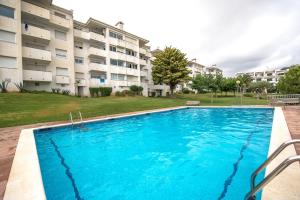 The swimming pool at or close to La Marina de Aiguadolç