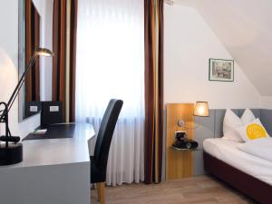 Postel nebo postele na pokoji v ubytování Avenon Privat-Hotel Am Steinberg
