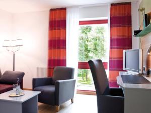 Posezení v ubytování Avenon Privat-Hotel Am Steinberg