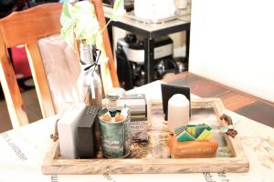 a tray with various items on a table at Memra Guest House in Ladysmith