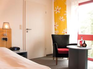 Postel nebo postele na pokoji v ubytování Avenon Privat-Hotel Am Steinberg