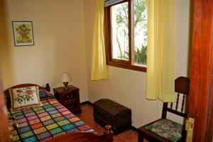 A bed or beds in a room at Casa Rural de Tío Félix