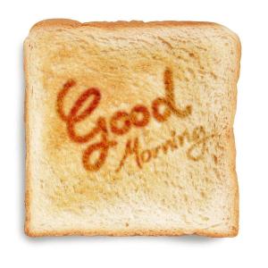 a piece of toast with the words good morning written on it at Drumhouse Guesthouse in Knock