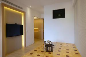 TV a/nebo společenská místnost v ubytování iLiving B&B