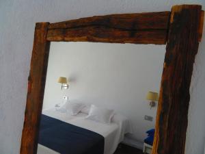 Postel nebo postele na pokoji v ubytování HOTEL MAÑET