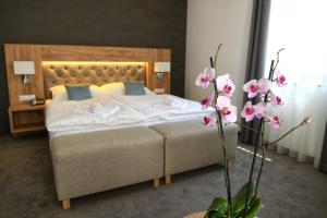 Postel nebo postele na pokoji v ubytování Hotel Diana