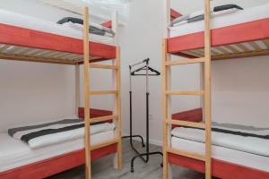 Postel nebo postele na pokoji v ubytování Apart & Hostel Konjic + 24 fotografií