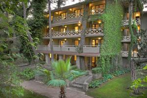 an exterior view of a building with ivy at Martı Myra - Ultra All Inclusive in Tekirova