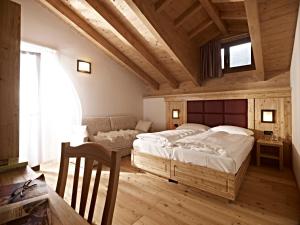 Katil atau katil-katil dalam bilik di Hotel Garni My Ledro