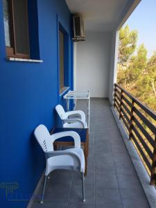 Uma varanda ou terraço em Hotel Athina