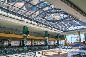 a view of a building with a glass ceiling at KAKTUS Hotel Kaktus Albir in Albir