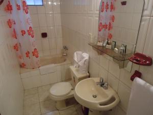 Koupelna v ubytování Hotel T'ika