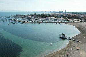 an aerial view of a harbor with boats in the water at Pension La Puntica in Lo Pagán