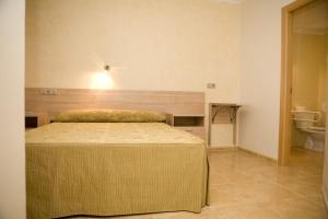 Cama o camas de una habitación en Hostal Casa Paco