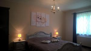 Postel nebo postele na pokoji v ubytování B&B Le Nid Doux (Vresse-Sur-Semois/Chairière)