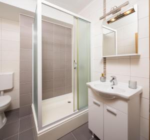 Koupelna v ubytování Apartment Krželj
