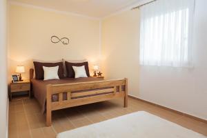 Postel nebo postele na pokoji v ubytování Apartment Krželj